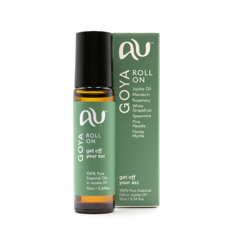 The GOYA Roll On is sitting on a white background next to its box. The bottle is long and slender with a green label and black lid. The box is green with white graphics.