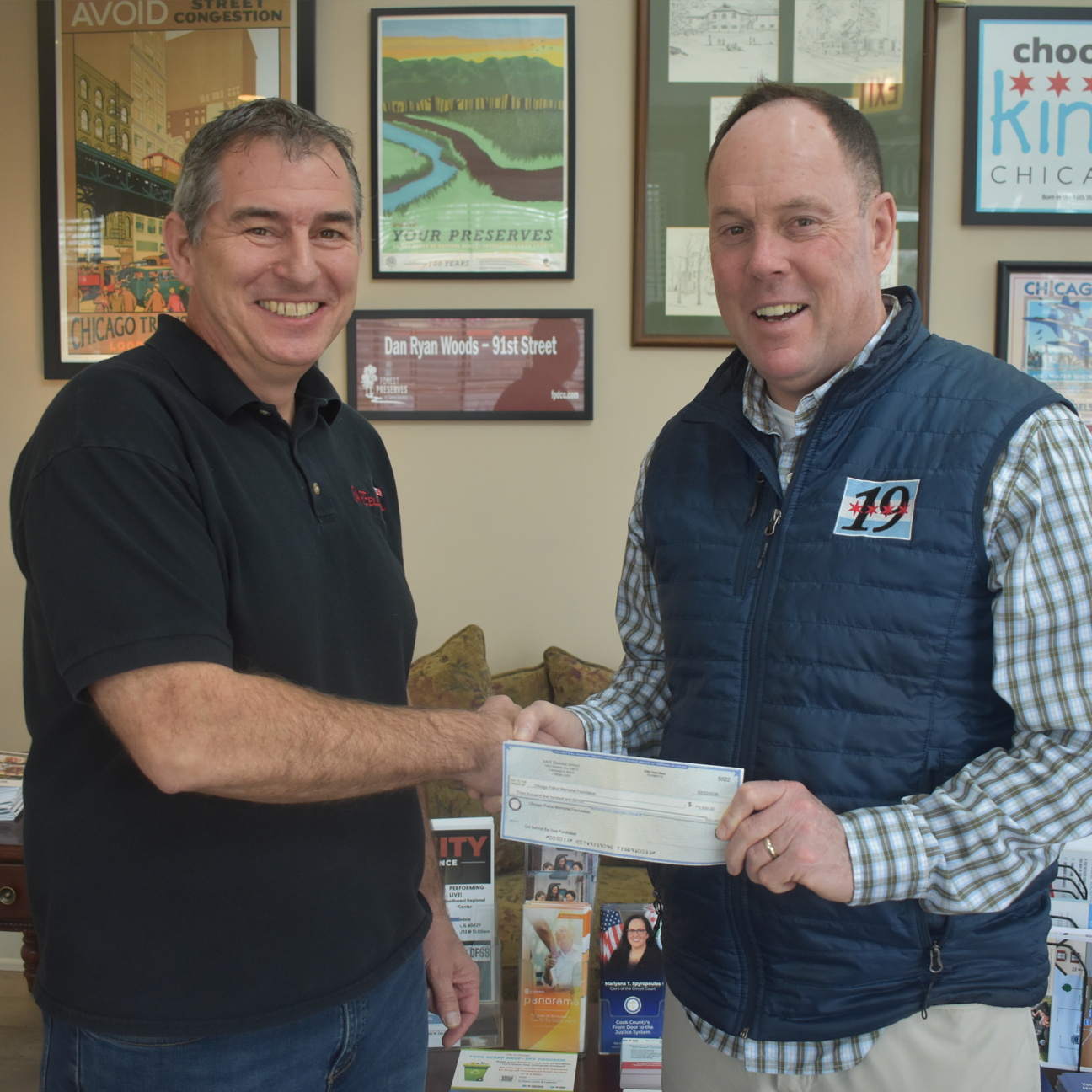 GET BEHIND THE VEST – In support of the annual Get Behind the Vest fundraiser, Charles presented a $3,500 donation check to 19th Ward Ald. Matt O’Shea on March 4. O’Shea hosts the fundraiser for the Chicago Police Memorial Foundation (CPMF), which pu