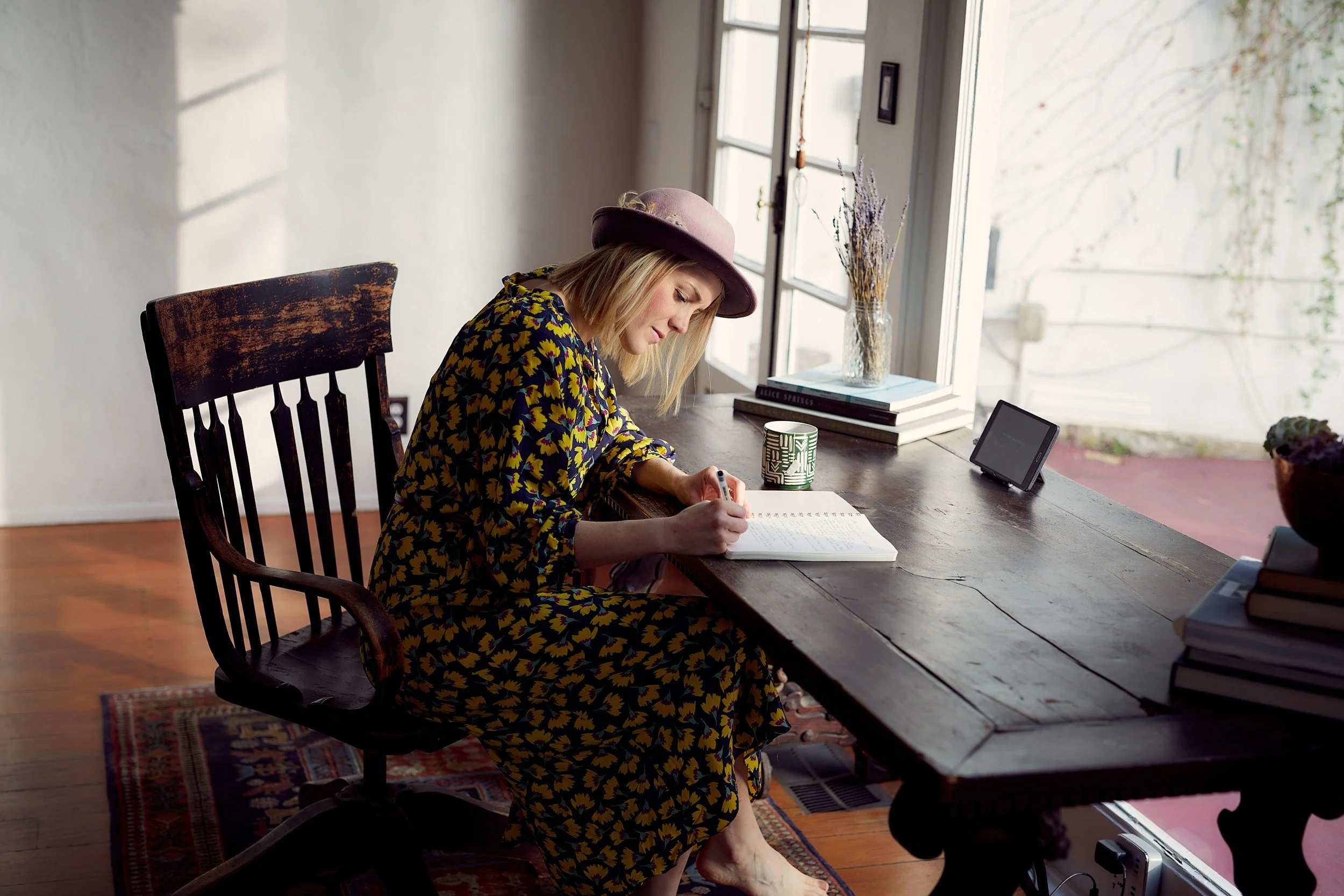 Woman habit stacking at a desk
