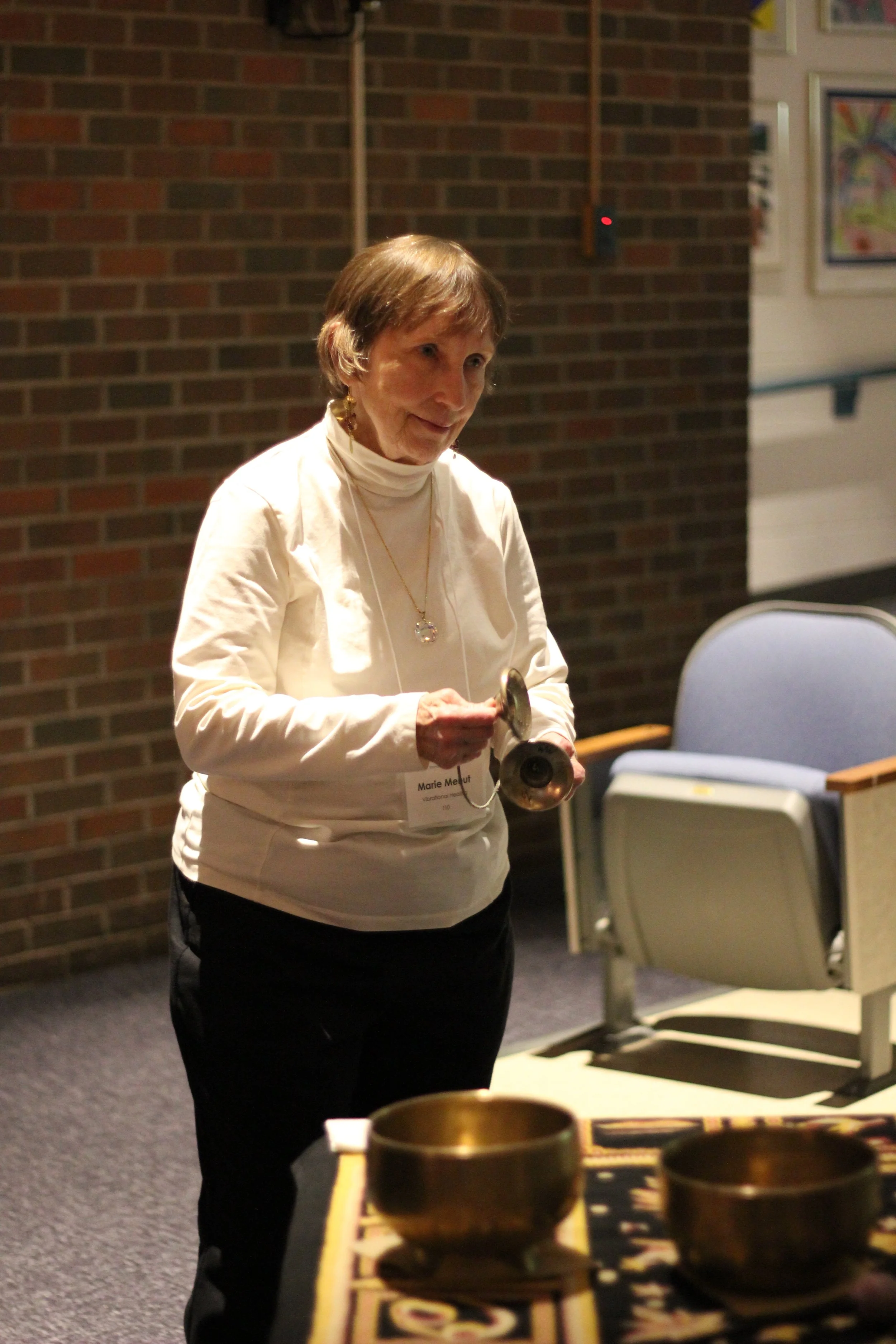 Marie Menut performing with The Conduit at Vernon Holistic Healthfest at Vernon Center Middle School in Connecticut in 2013.