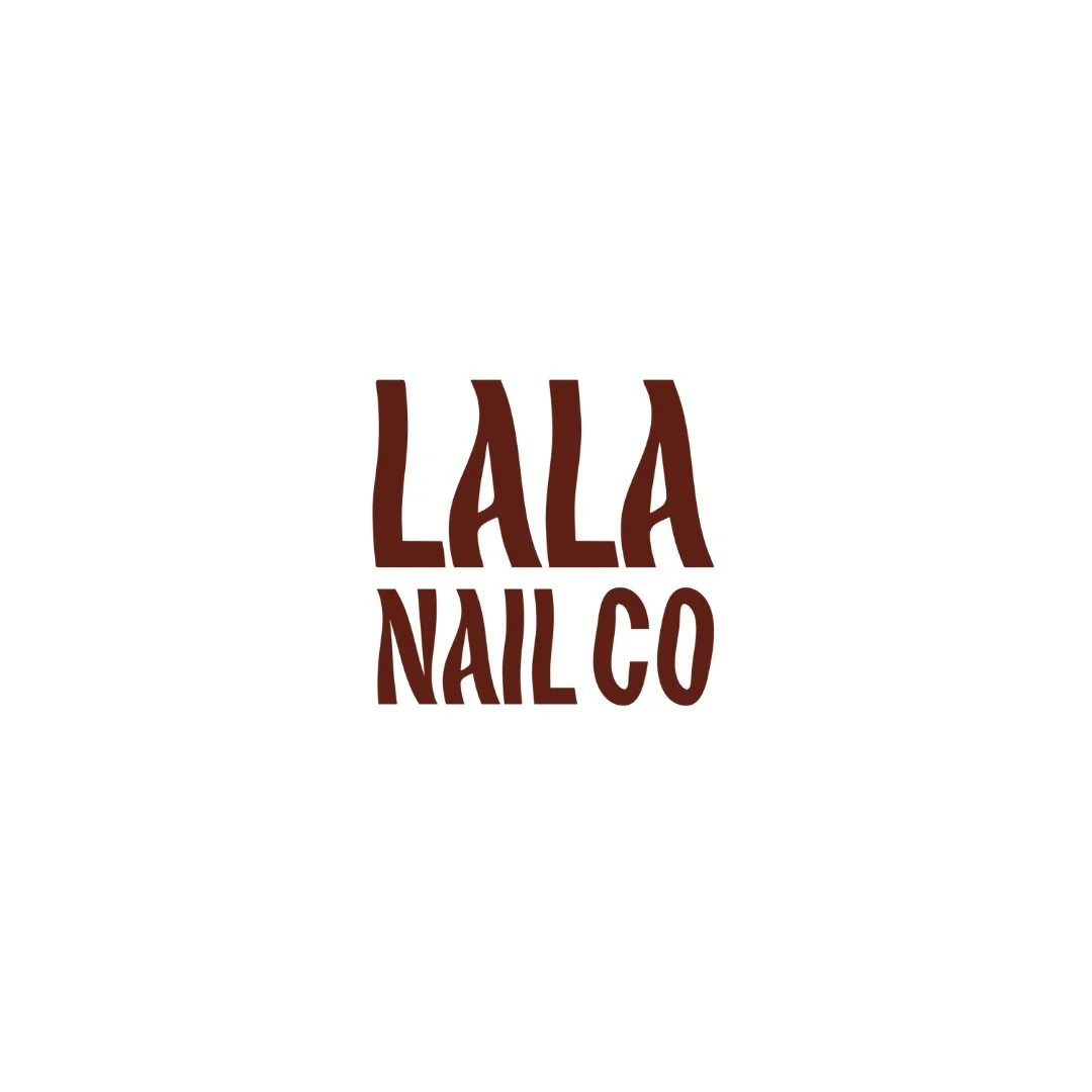 Logo for Lala Nail Co with stylized text in dark brown on a white background.