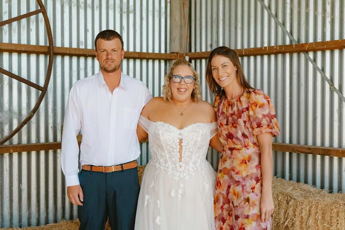 Celebrant Ollie van der Pol with newly married couple after their ceremony lopement ceremony at The Starling Homestead.