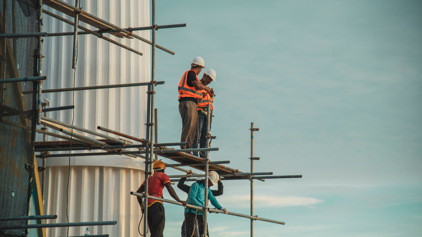 Construction workers on high-rise building structure during construction in GTA