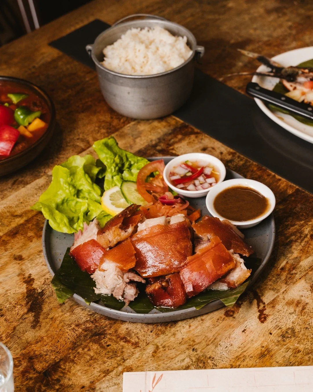 🥩✨ Cebu&rsquo;s Authentic Roasted Pork Belly: crispy golden crackle, tender meat, and rich house-made liver sauce that takes every bite to the next level.

At Mama Lor, our Cebu Lechon Belly is roasted to perfection, served with fresh sides and sauc