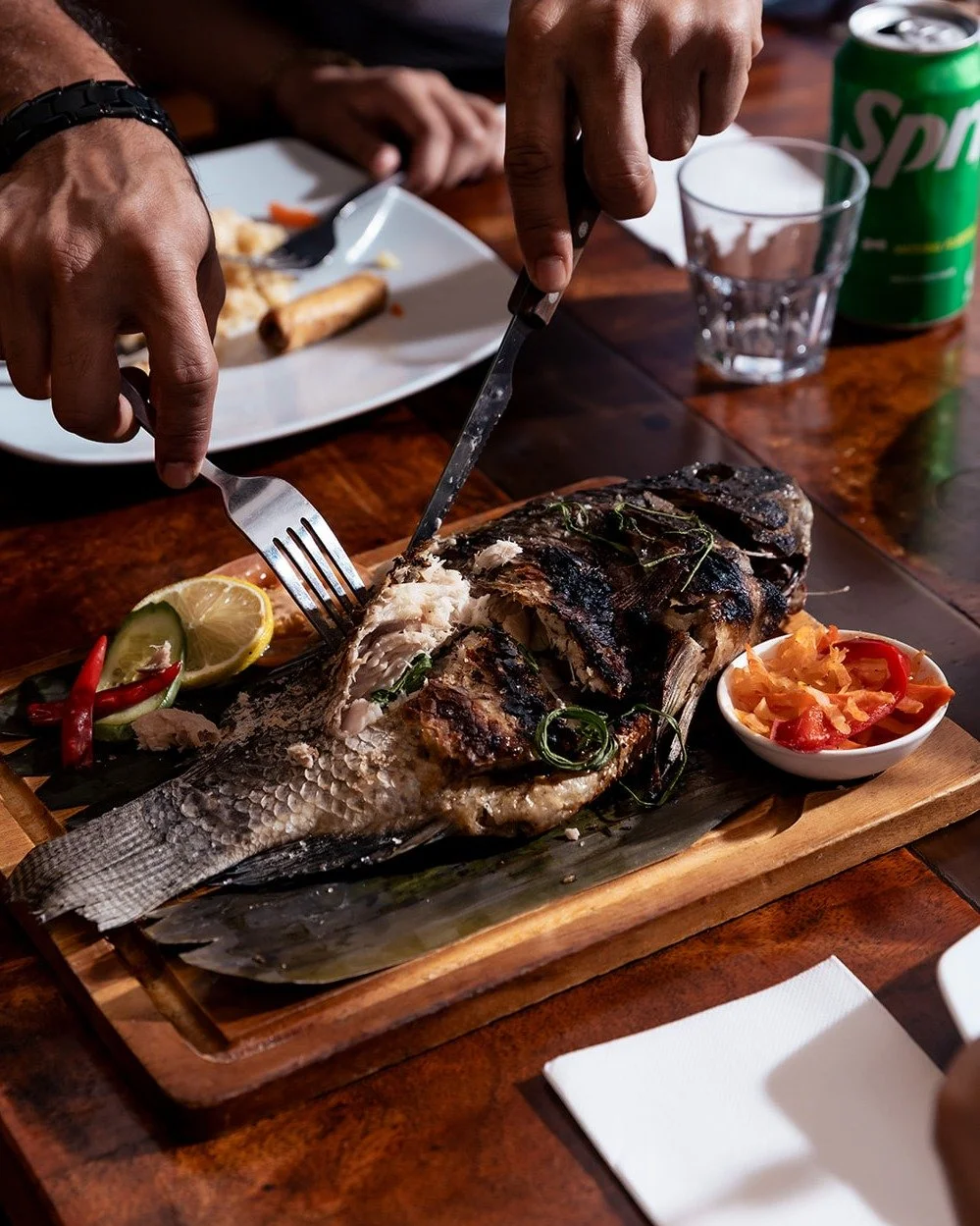 Perfectly grilled, smoky, and stuffed just right 🐟

Our Inihaw na Bangus is a Filipino classic done the Mama Lor way. Juicy milkfish grilled over open flames, served with calamansi and pickled sides for that perfect balance of flavour. Comfort food 