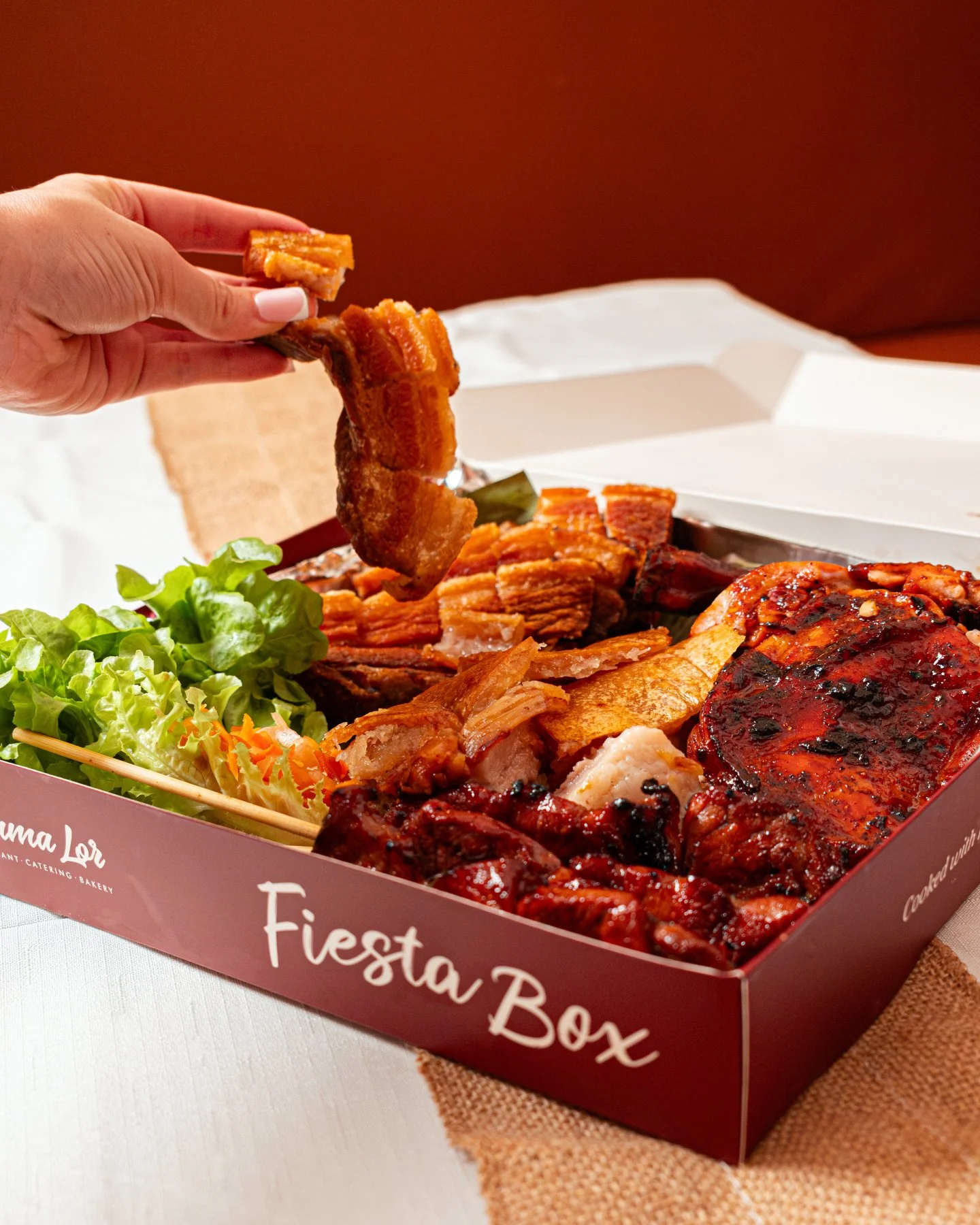 The Mama Lor Fiesta Box is built for serious Filipino flavour.

Inside you&rsquo;ll find a feast of favourites
Chicken Inasal
Filipino BBQ
Cebu Lechon
Grilled Liempo

Smoky, juicy, crispy and packed with the bold flavours that make Filipino food unfo