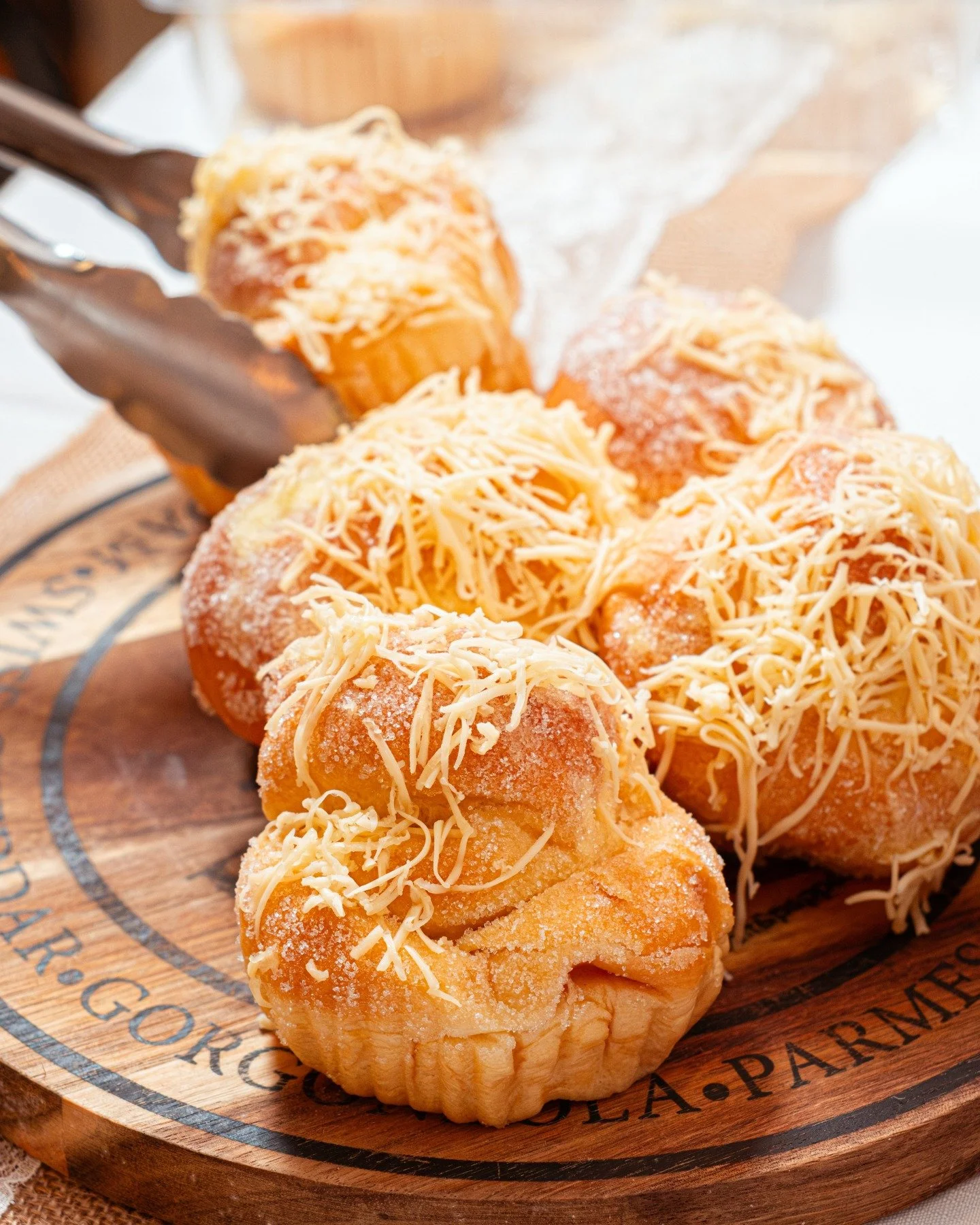 Soft, buttery, and straight out of the oven.

Mama Lor&rsquo;s baked ensaymada loaded with sugar and cheese, perfectly balanced between sweet and savoury. Light, fluffy, and impossible to stop at one.

Fresh batches coming out daily, don&rsquo;t wait