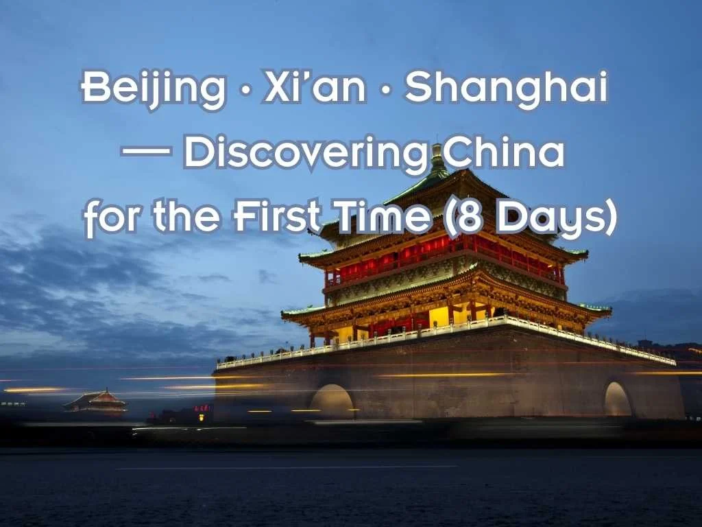 Photo of a traditional Chinese pagoda illuminated at night, with a cloudy sky in the background.