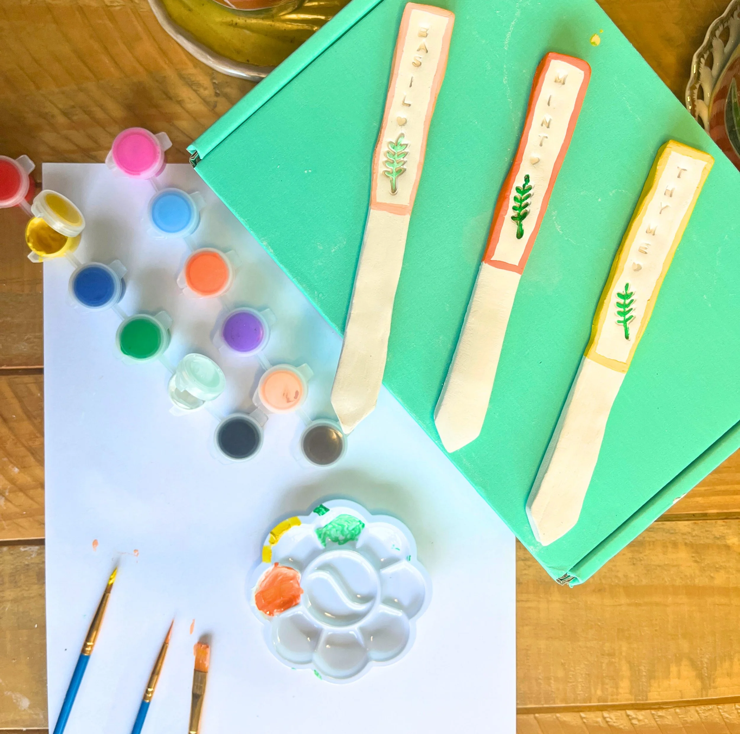 Colorful painted Popsicle crafts with