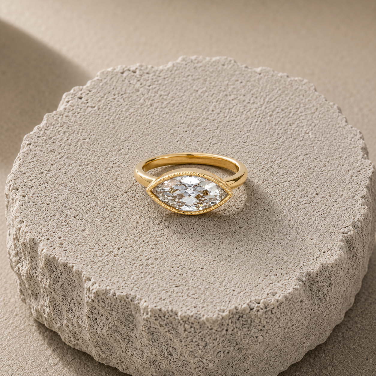 Marquise cut bezel sest ring.png