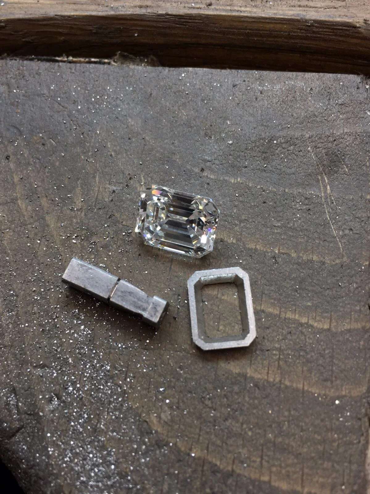 Bespoke platinum 3 carat emerald-cut diamond ring with 0.60 ct tapered baguettes handcrafted by Hatton Garden jeweller Daniel London