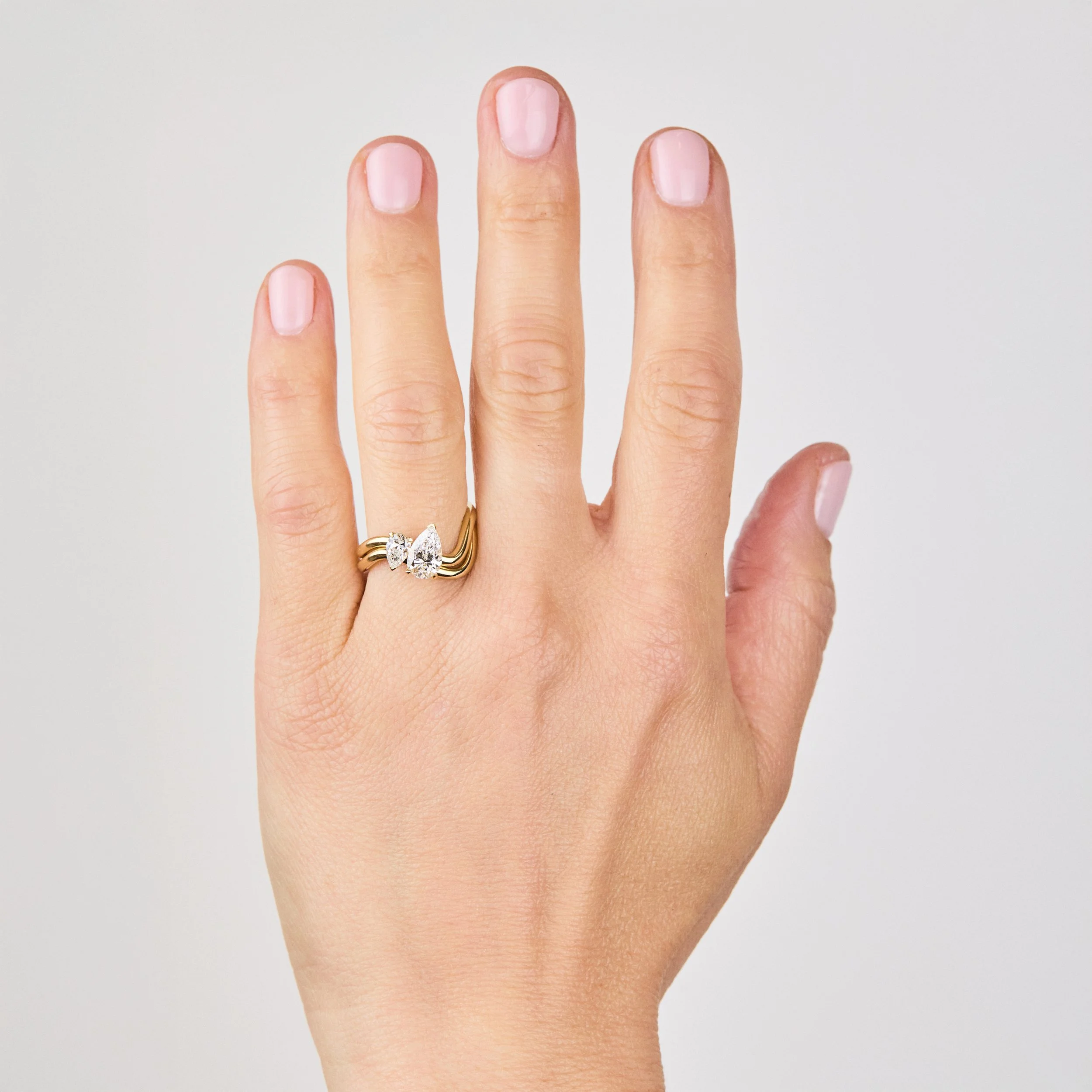 18ct Gold ‘Moi et Toi’ Pear Twist Diamond Ring on hand