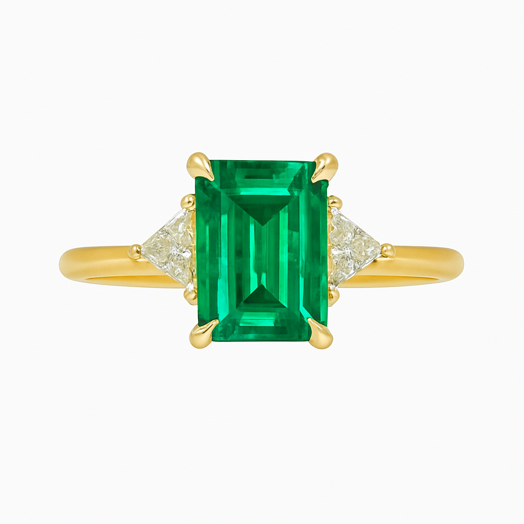 18ct gold octagonal-cut Zambian emerald ring with trilliant diamonds handmade by Daniel in Hatton Garden London.