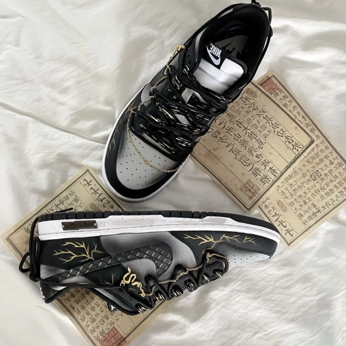 Nike Dunk Low Dragon Vein Custom black and gold sneaker with gold chain and dragon charm