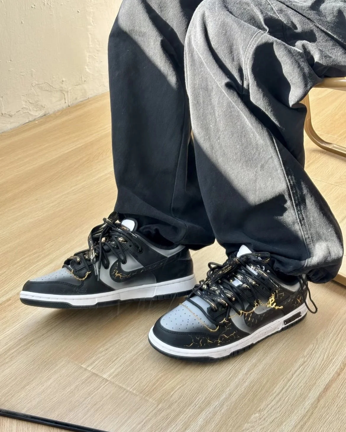 Nike Dunk Low Dragon Vein Custom black and gold sneaker with gold chain and dragon charm.jpeg