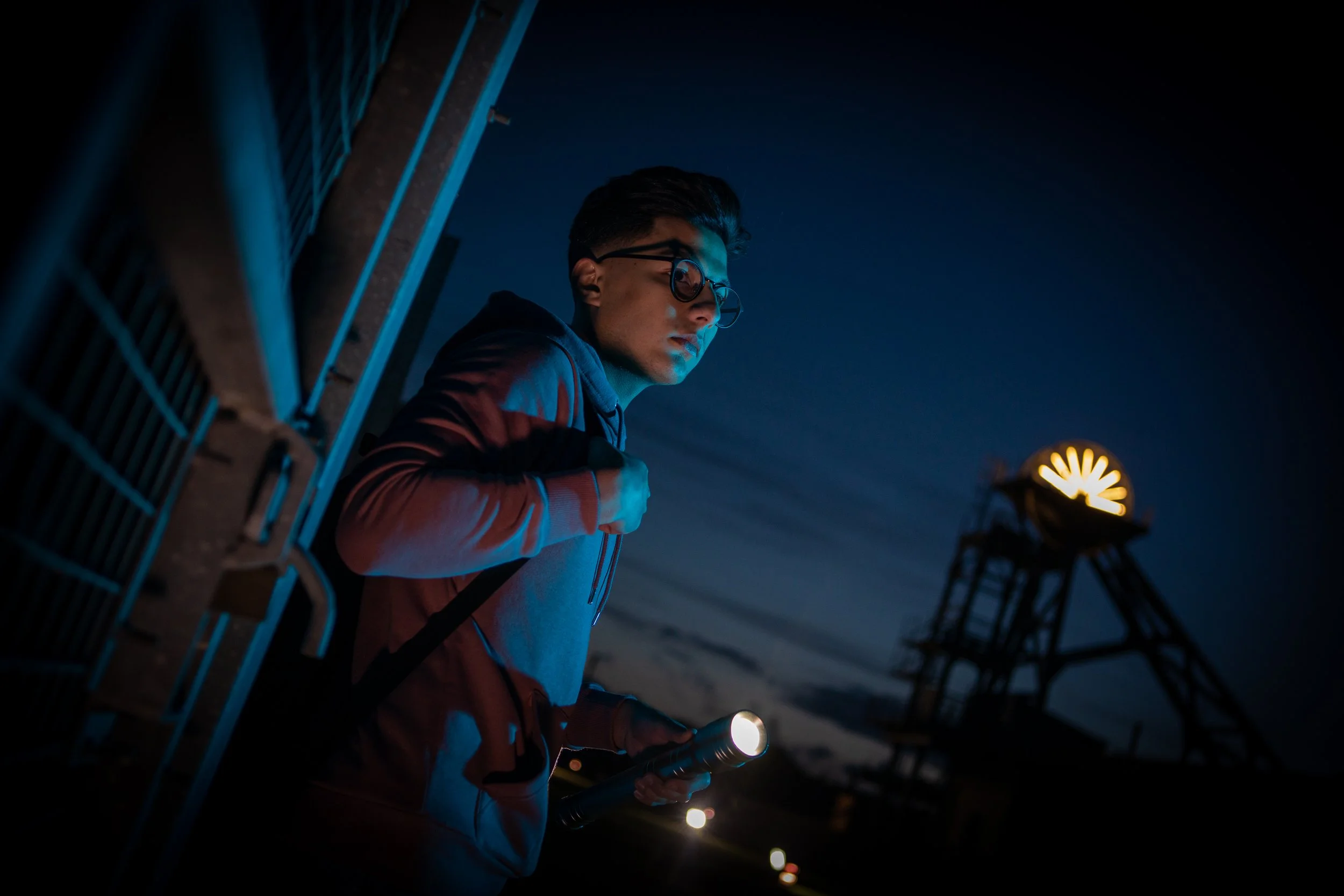 A young man photographed at Woodhorn Museum at night.
