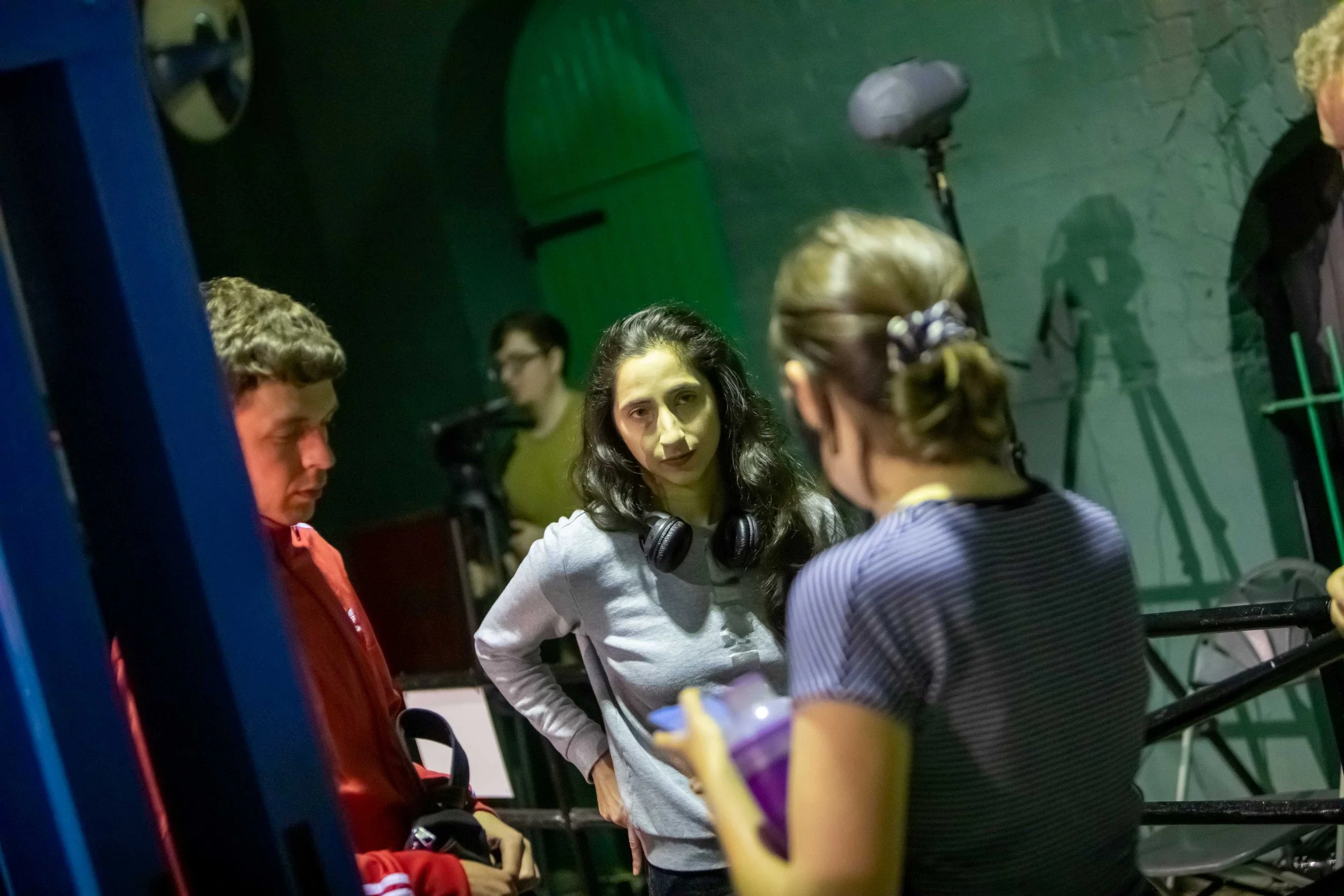 Two actors talking to a producer 