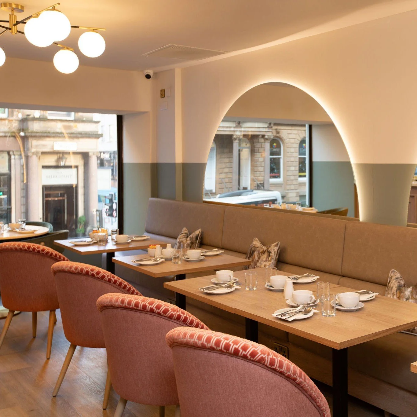 The Address scatter cushions in breakfast room.jpg