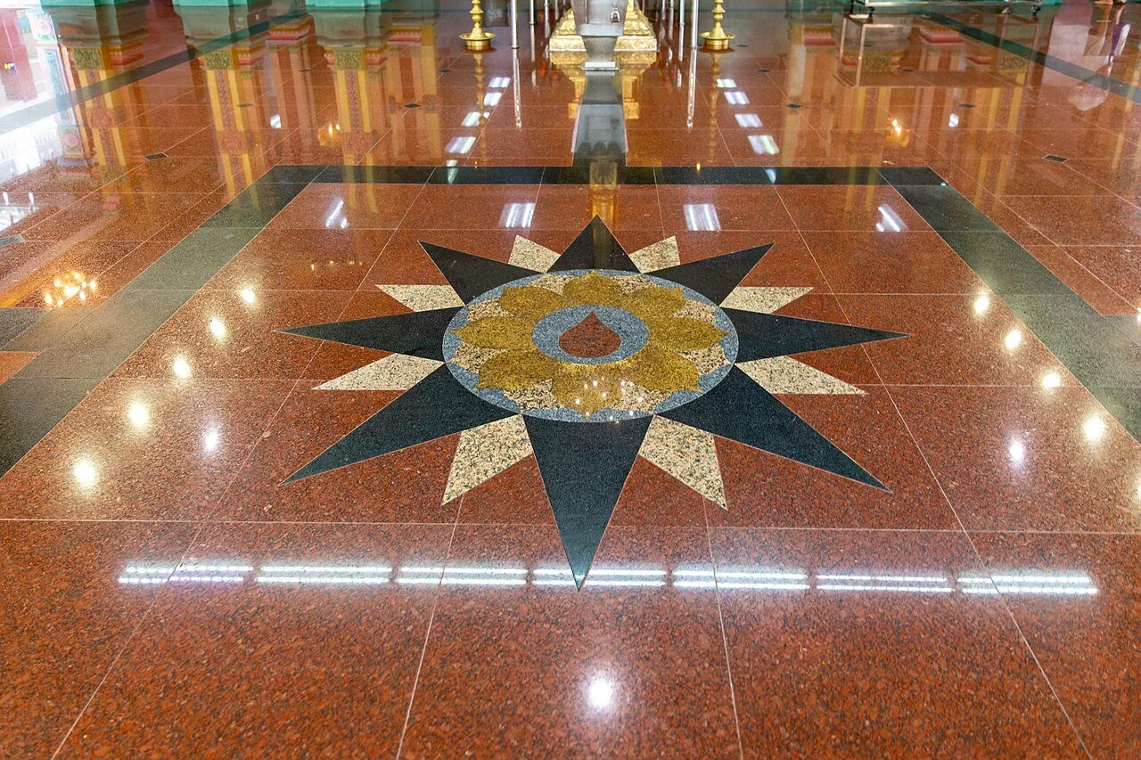 Installed granite floor showing the natural pattern and polished stone surface