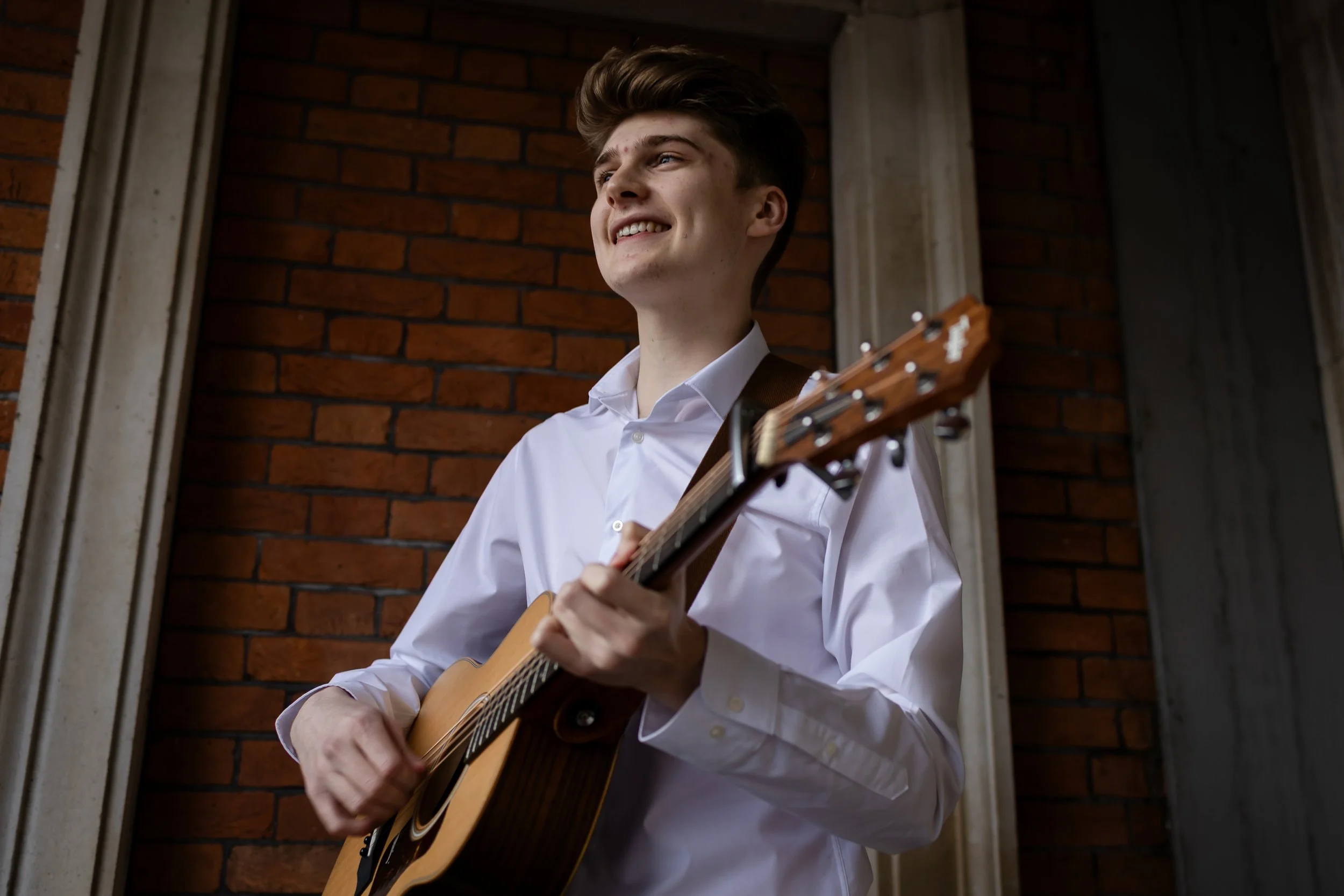 Oscar Flanagan playing outside Eaves Hall