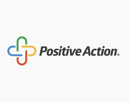 Logo of Positive Action featuring a multicolored plus sign and the words "Positive Action"
