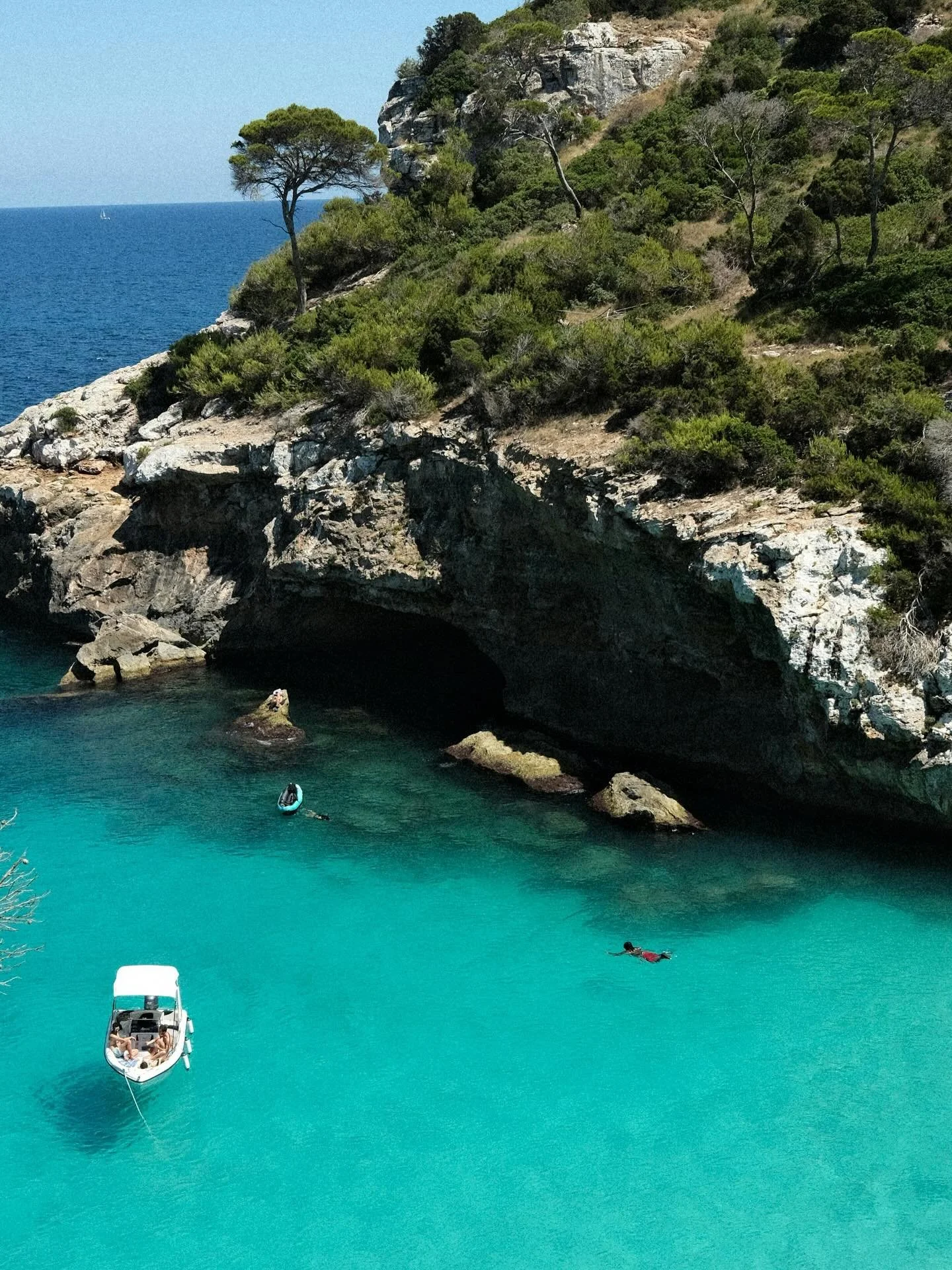 There are corners of Ibiza that still feel untouched.
No beach bars. No sound but the sea.
Just turquoise water, old boats, and the kind of silence that makes you think again.

It&rsquo;s in places like this that I remember why I came here.
To slow d
