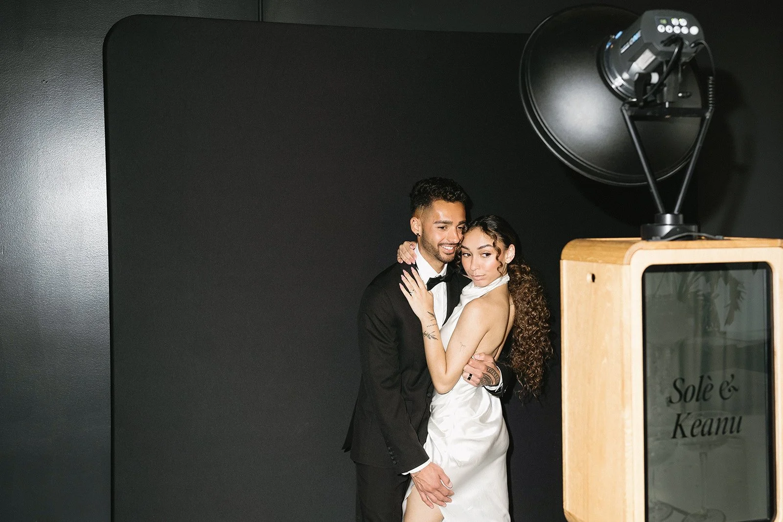 photo booth strips on top of a luxury photo booth