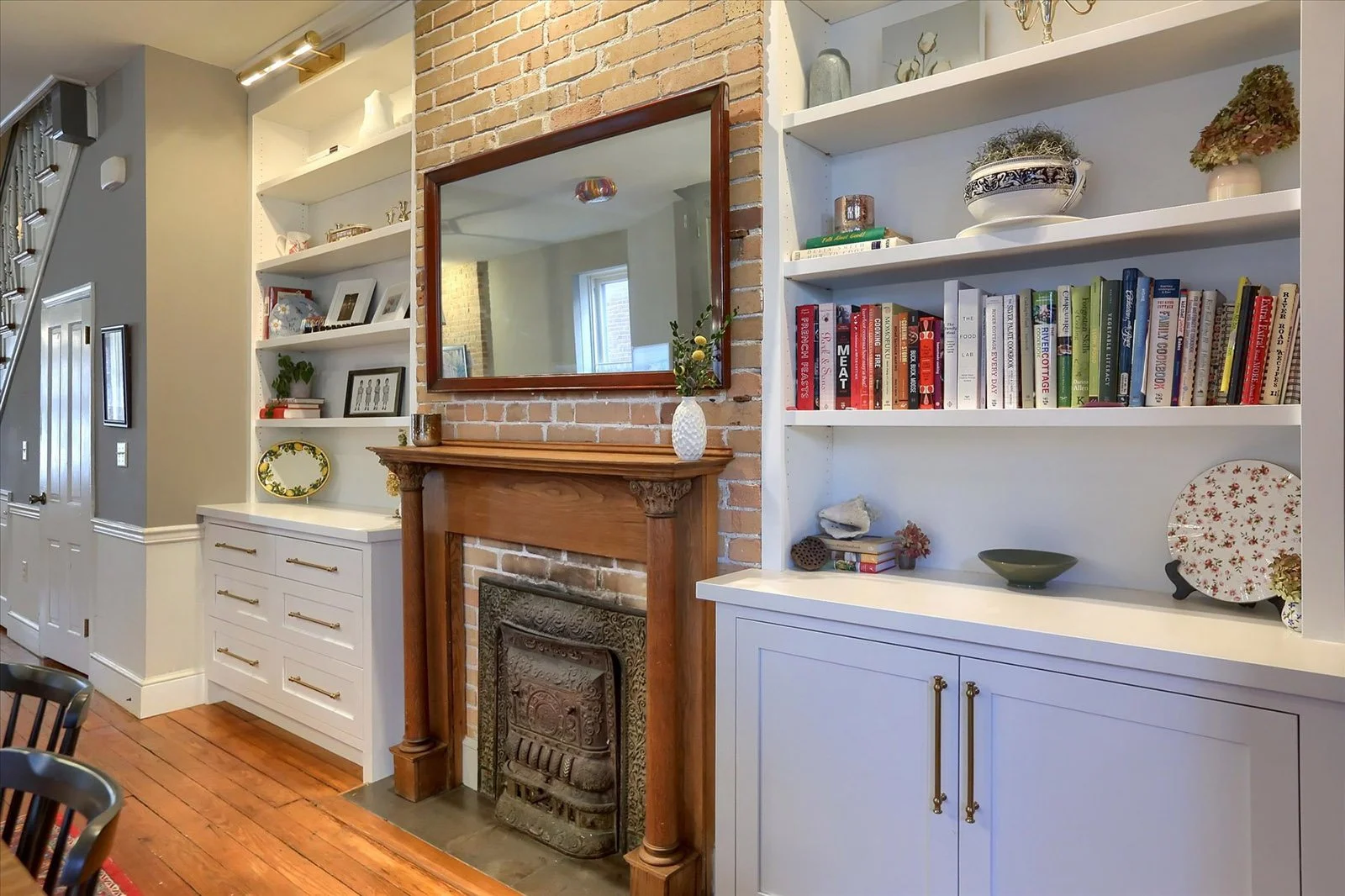  large custom built-in cabinets by Connor Design-Build incorporating original fireplace 