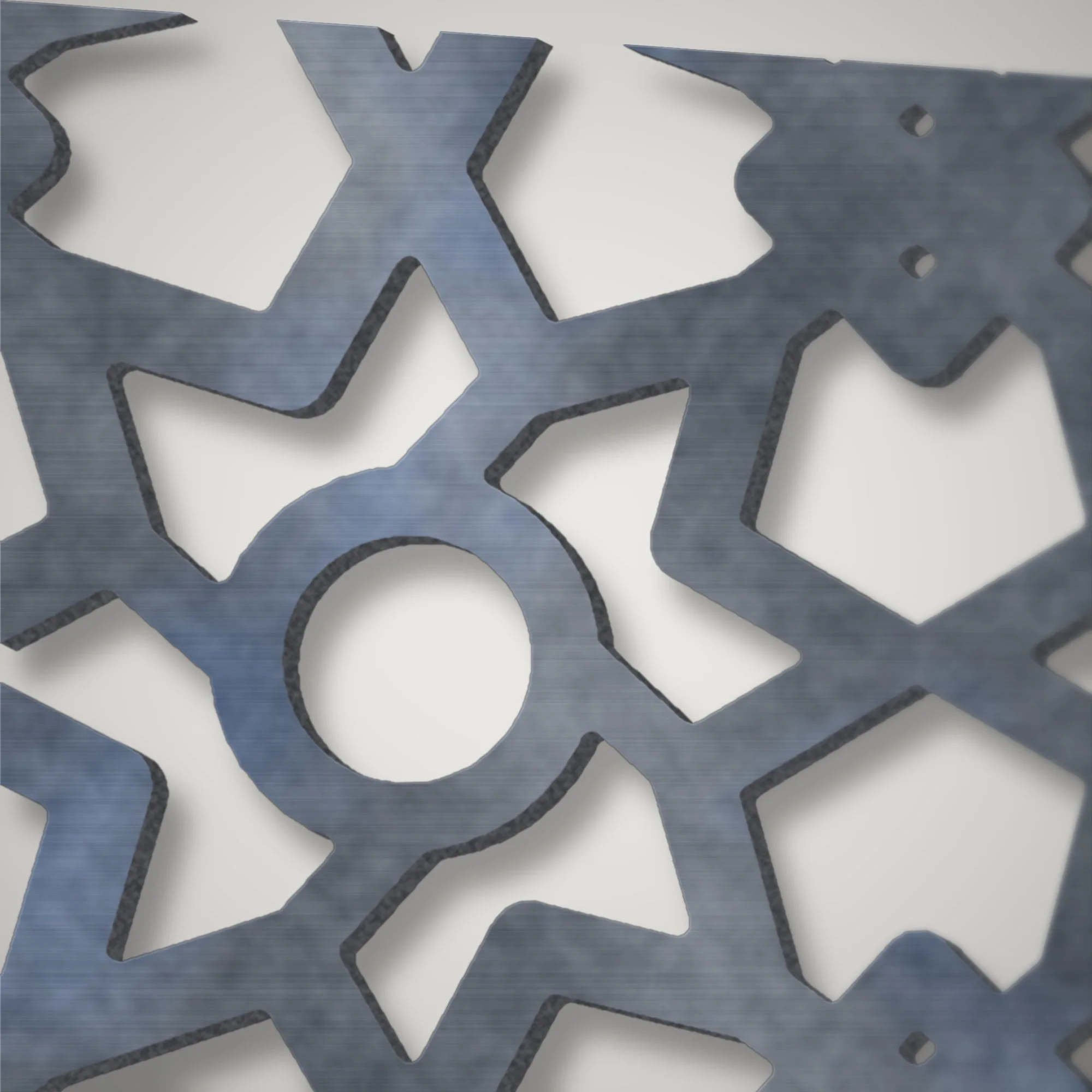 Close-up of the plasma-cut star lattice on the privacy screen showing the cut edge of 3 mm mild steel