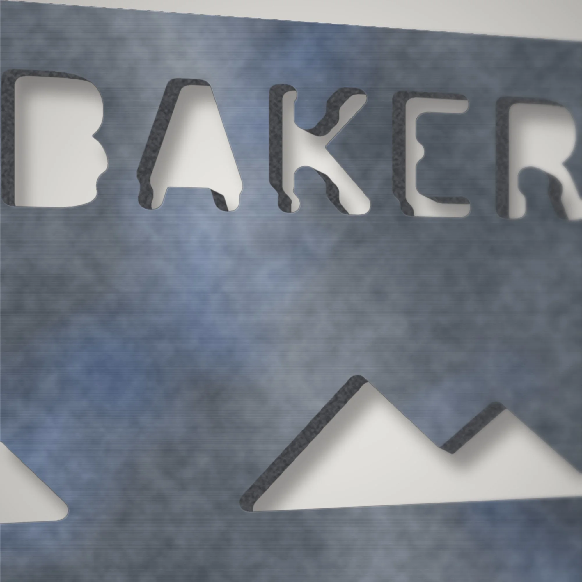 Close-up of stencil lettering plasma-cut through 4 mm steel, showing the clean cut edge