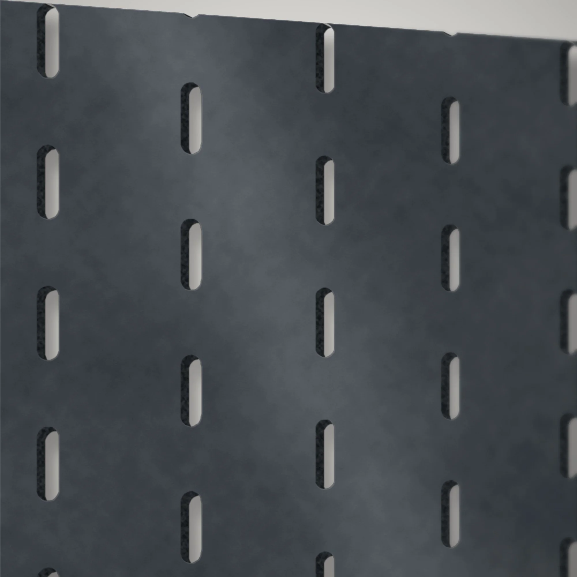 Close-up of plasma-cut slots in a 3 mm steel pegboard panel