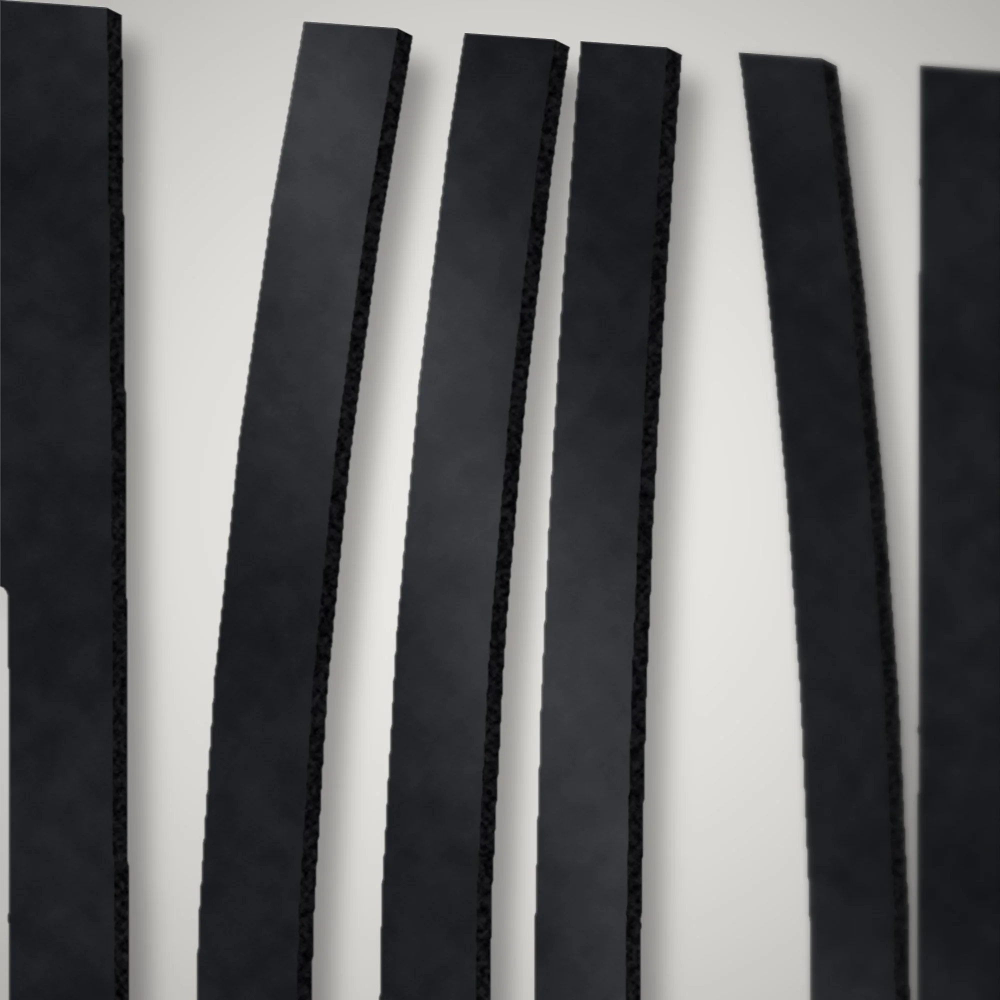 Close-up of plasma-cut bulrush heads in the low gate infill, showing the cut edge of 3 mm mild steel