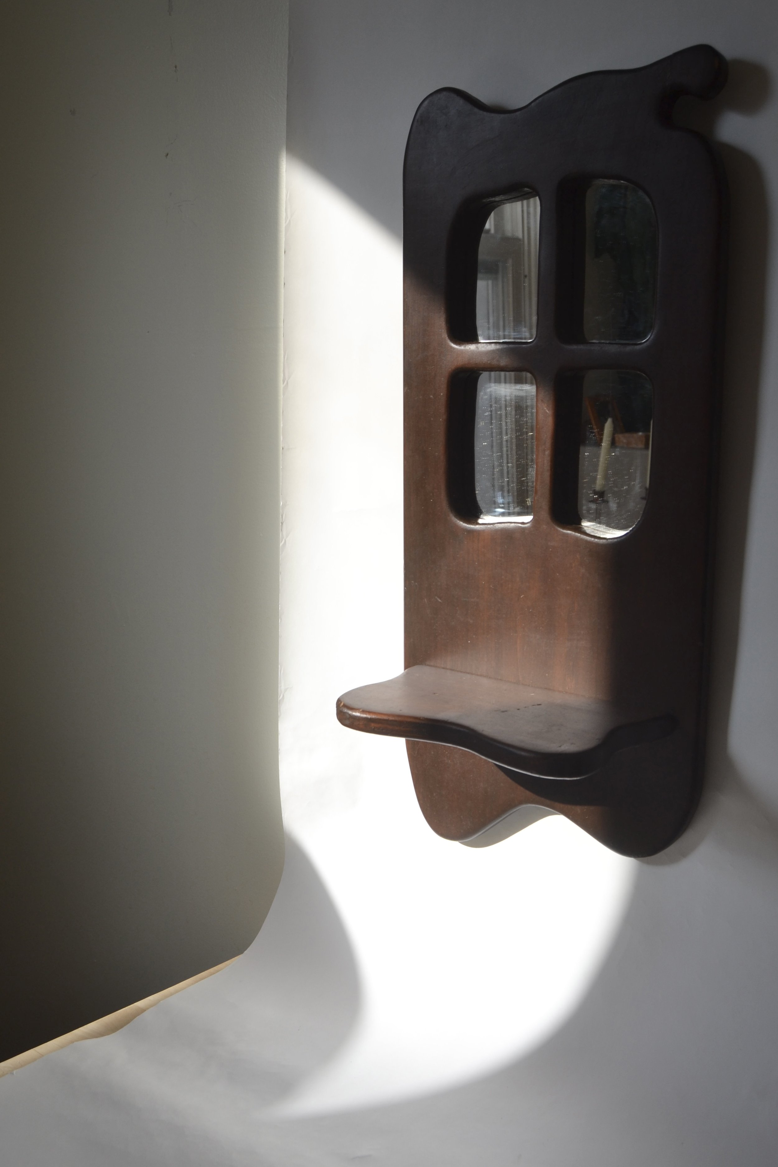 Wood entrance mirror and shelf.
