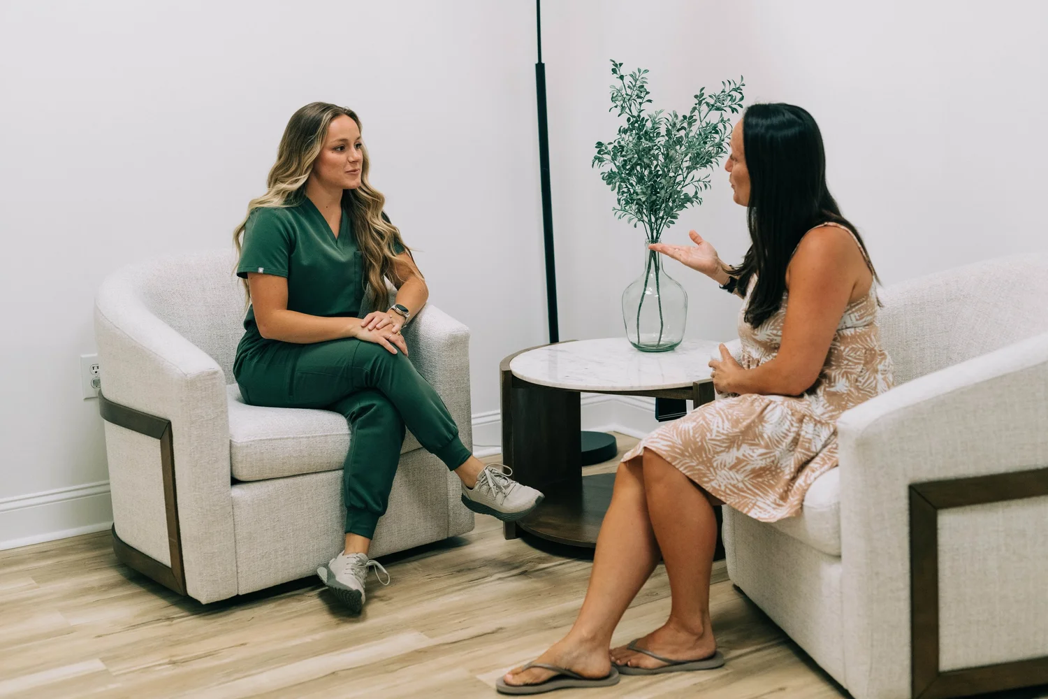 Woman meeting with our nurse