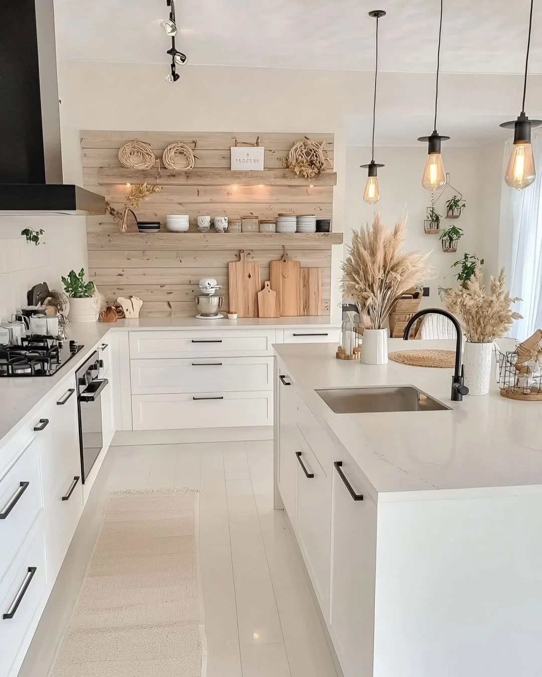 BEAUTIFUL SPACES: I love this kitchen design with a combination of white and black, antique wood backsplash including all the black fixtures and handles. Just love.

Credit: Pinterest

#beautifulspaces #interiordesigns #homearchitect