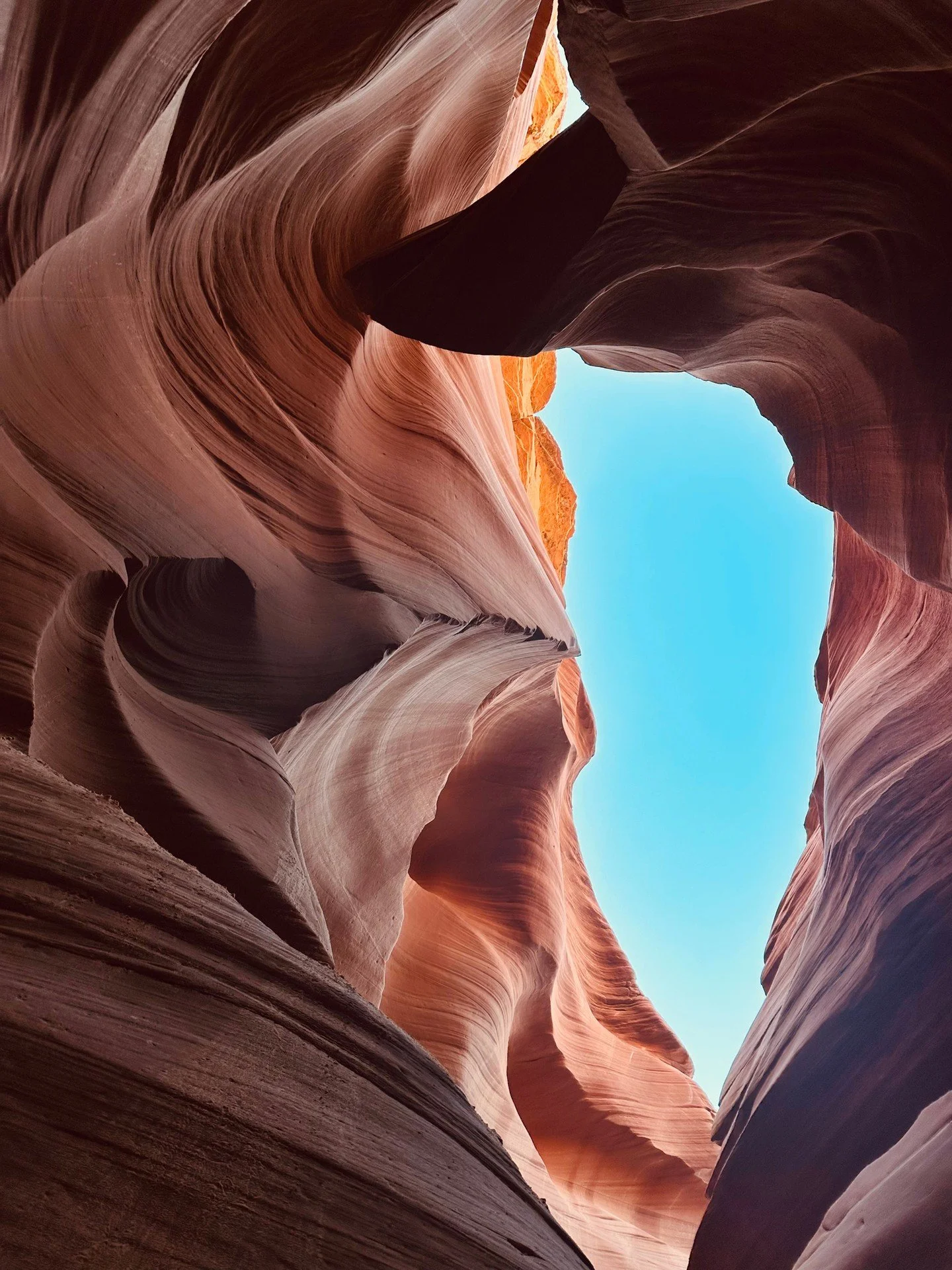 HIKING TRAVELS: Navajo Upper Antelope Canyon is a slot canyon in the American Southwest, on Navajo land east of Lechee, Arizona.

Visitors will observe direct sunlight radiating down from openings at the top of the canyon, which make the inside canyo