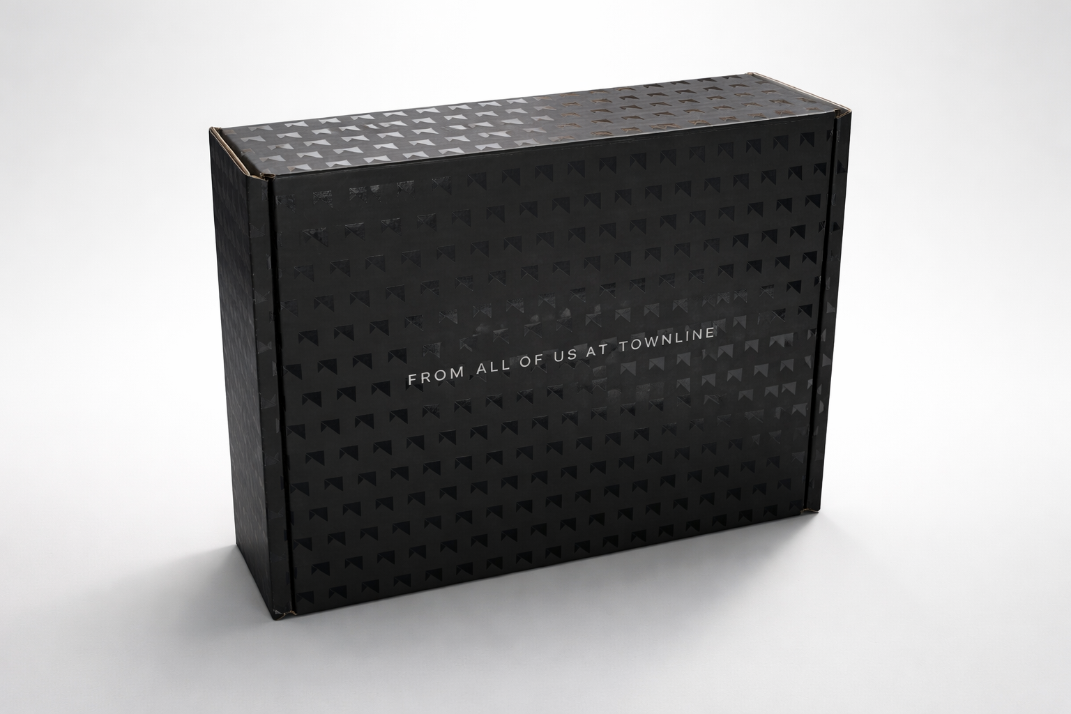Luxurious black gift box display.png