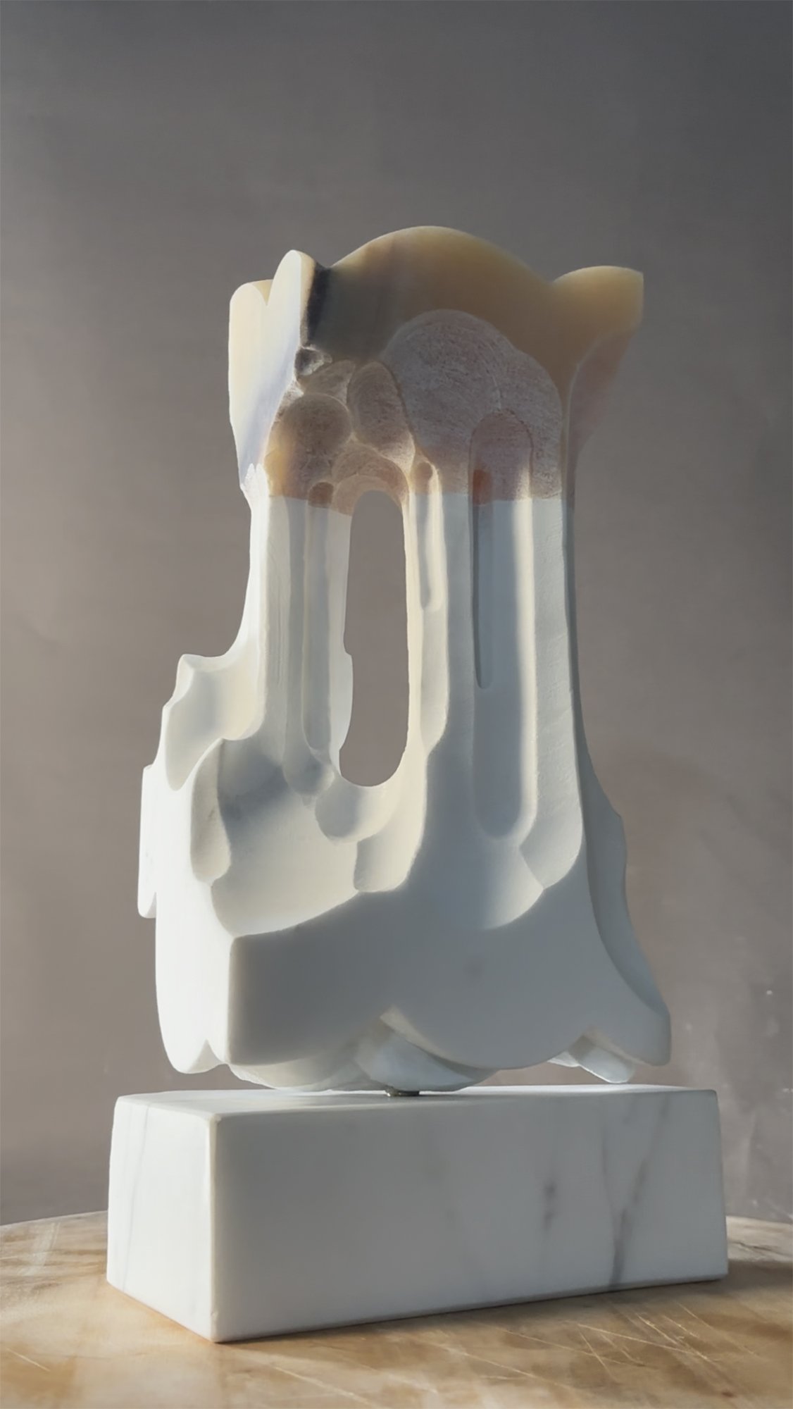 'Nebula' .
Statuario Carrara white marble and orange onyx .
Height - 35cm .
Width - 21.5cm .
Depth - 13cm .
POA