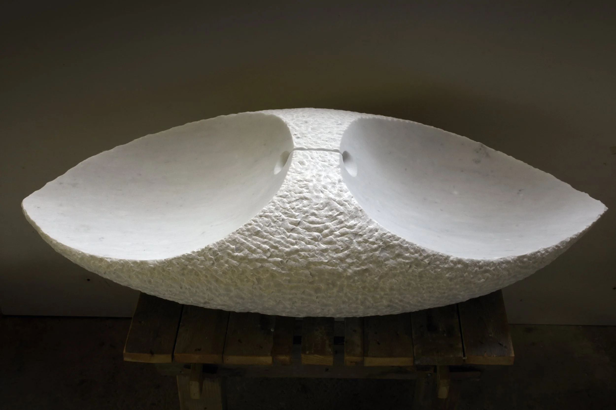 ‘Moment’ .
White Carrara marble .
Height - 25cm .
Width - 107cm .
Depth - 48cm .
POA