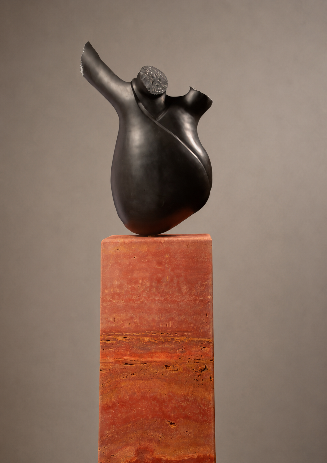 'Bolgán' .
Belgian black marble on Iranian travertine base .
Height - 140cm .
Width - 50cm . 
Depth - 40cm .
POA