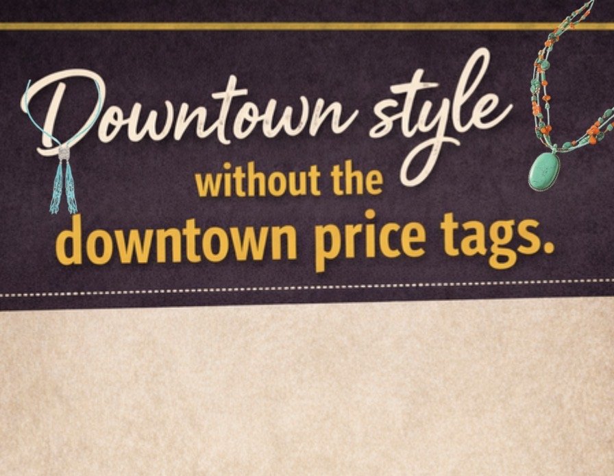 A sign with the text 'Downtown style without the downtown price tags,' featuring decorative necklaces hanging from the top.