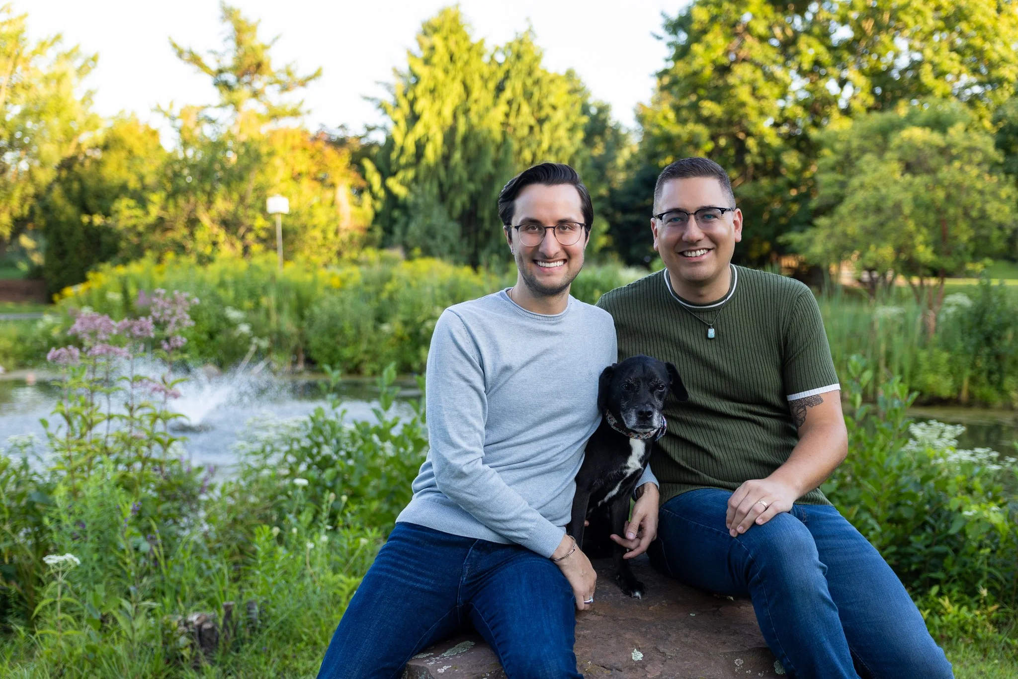 Male couple with dog at park