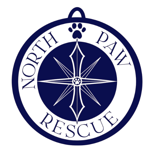A circular emblem with the text 'North Paw Rescue' around the inside edge and a paw print at the top, featuring a compass design at the center.