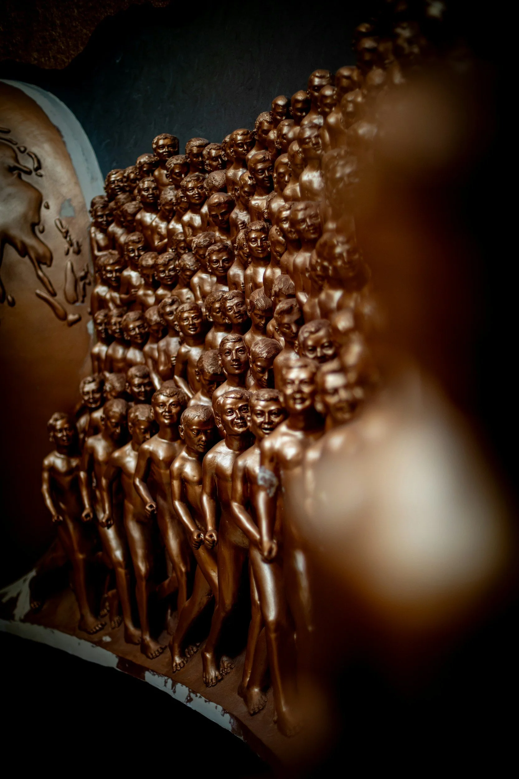 sculpture of bronze men