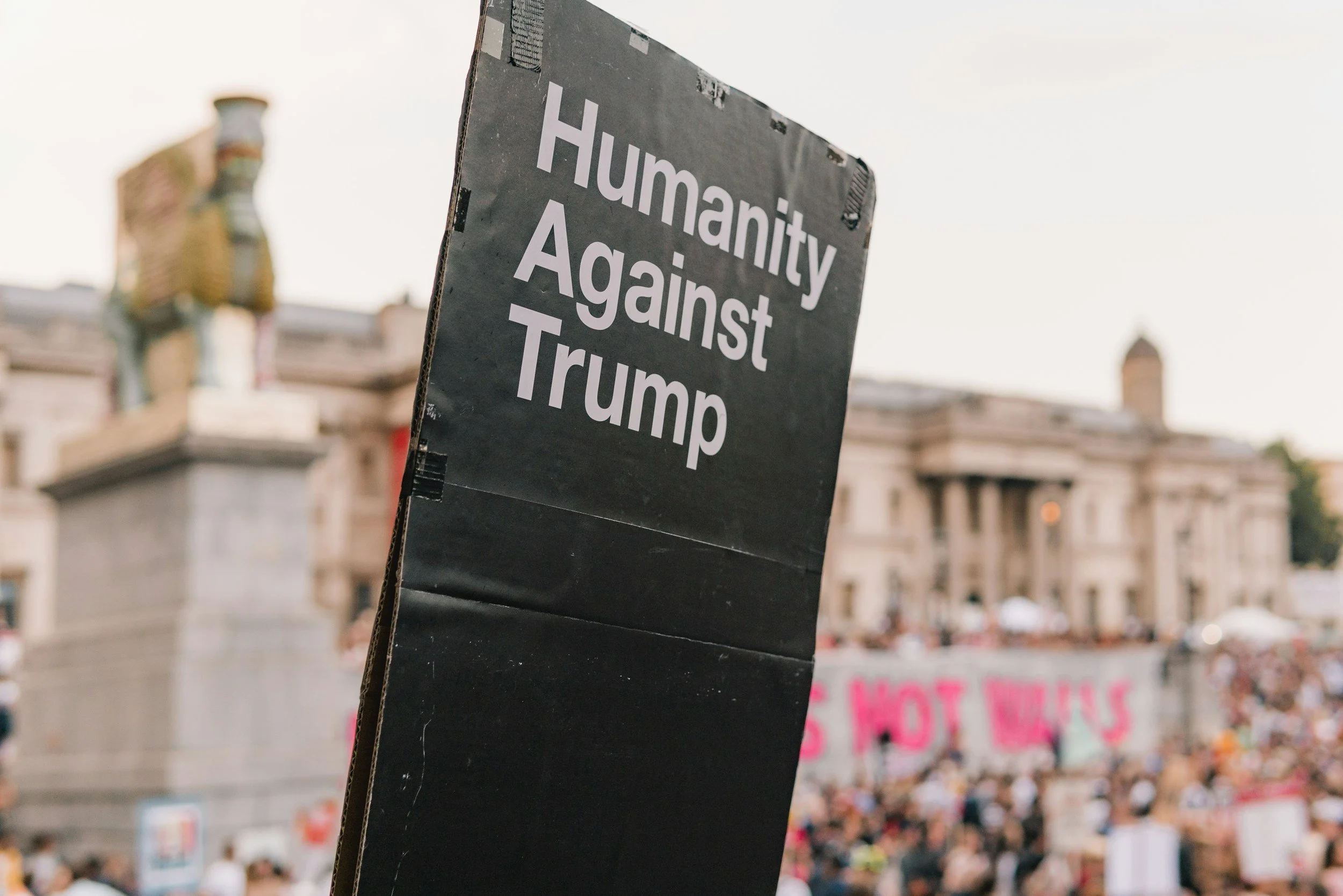 Humanity against Trump banner