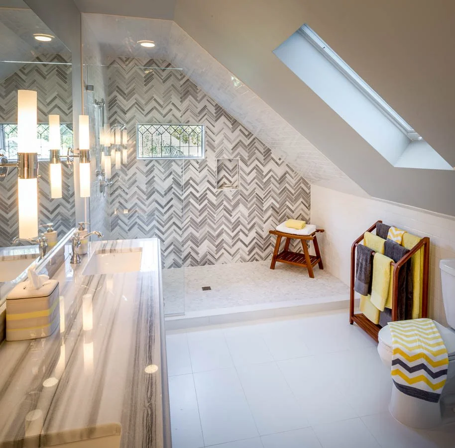 Modern bathroom with a sloped ceiling
