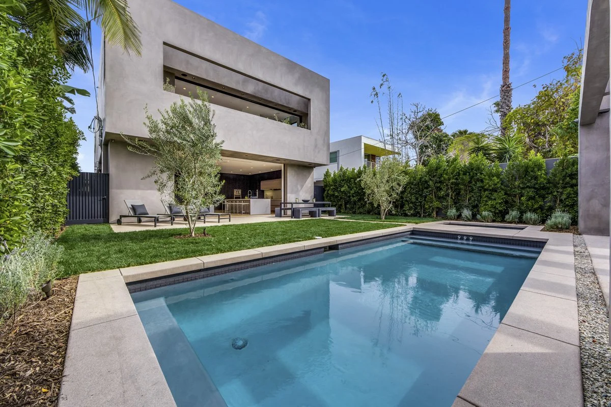 West Hollywood custom home backyard with modern pool, spa, and minimalist concrete architecture