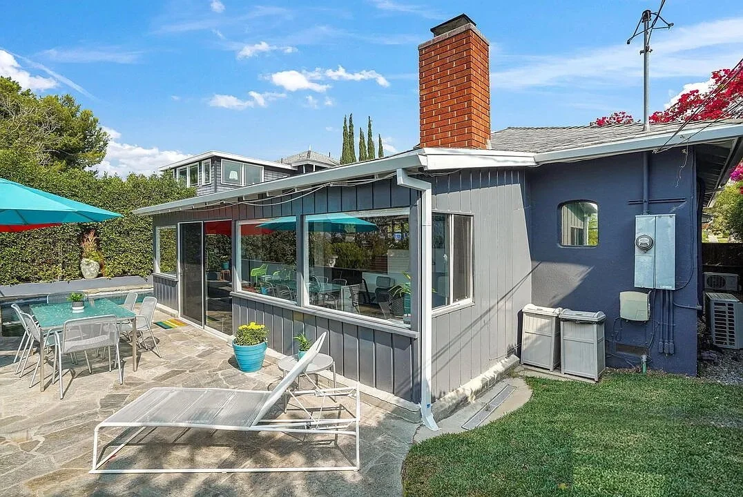 Before – Mar Vista backyard patio with existing single-story home, limited indoor-outdoor connection