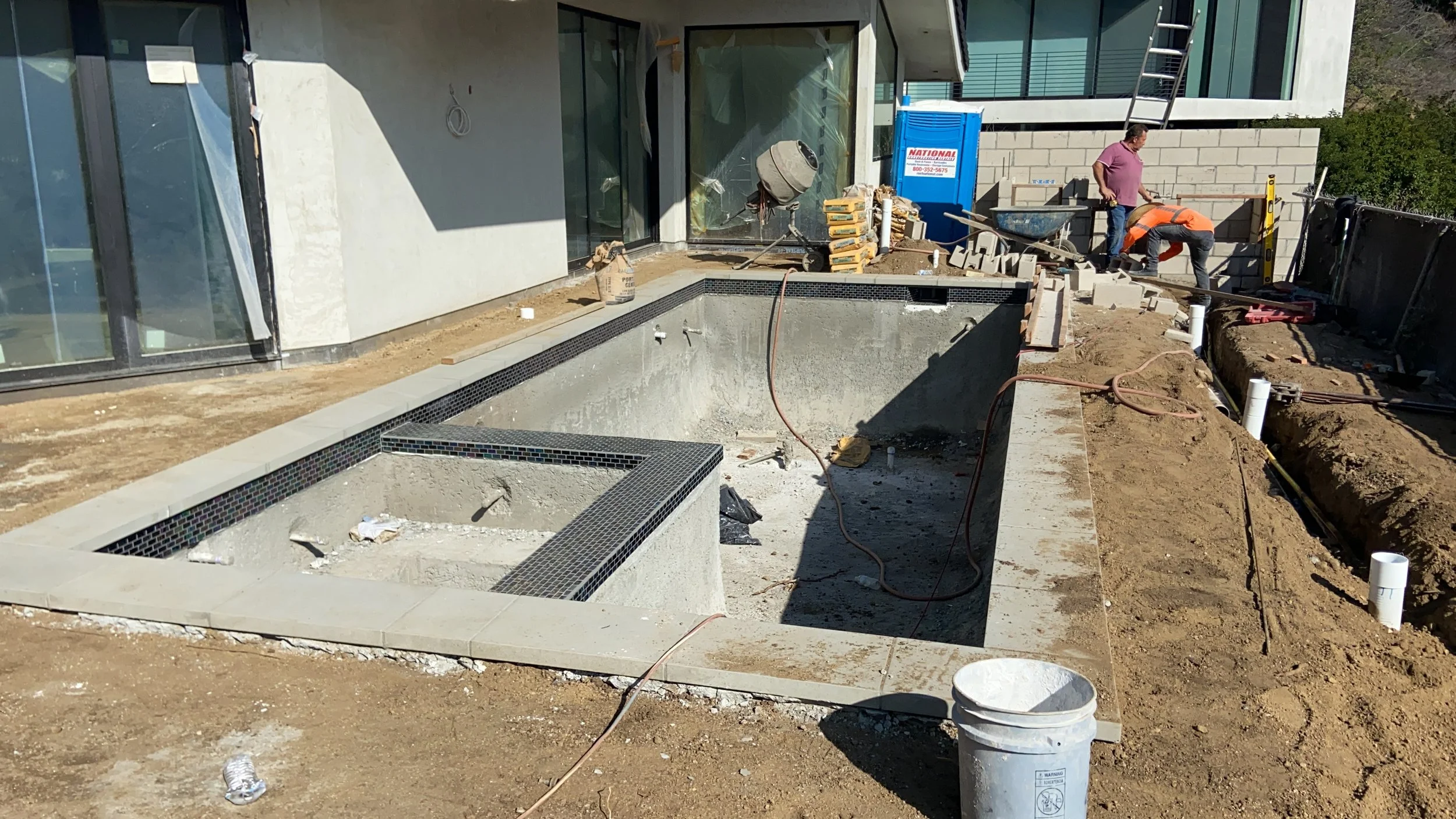 Hollywood Hills kitchen remodel in progress with new cabinetry installation, island framing, and finish preparation