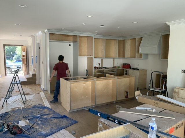 Hancock Park kitchen remodel in progress with cabinetry installation, layout framing, and interior build-out underway